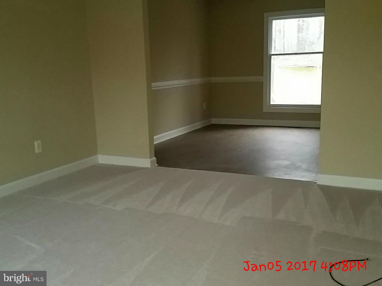 9285 Caledon Road King George, VA 22485 - Photo 8 of 17 Living Room looking toward dining room