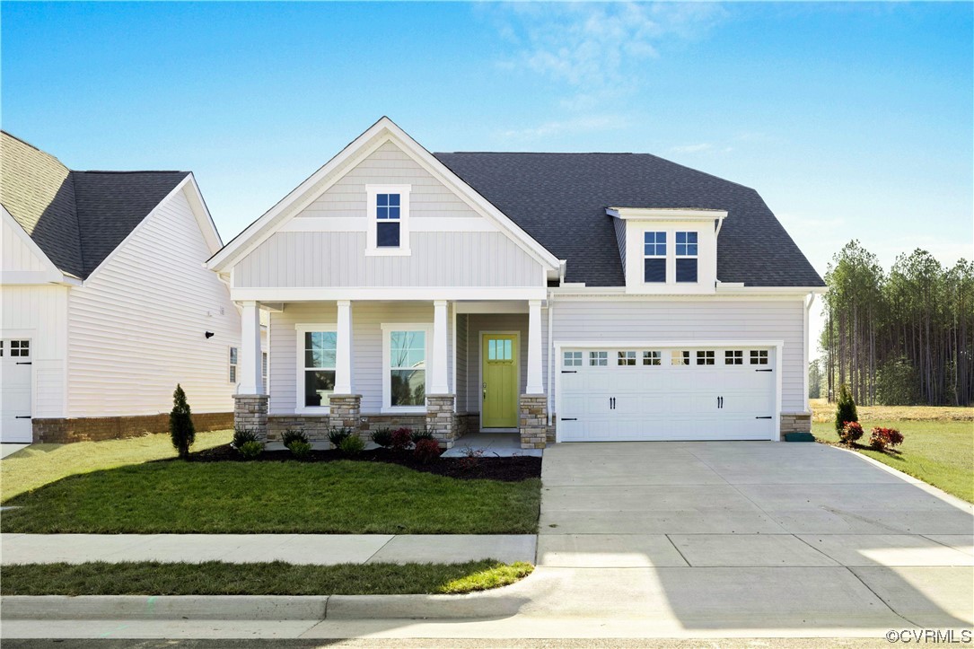 a view of a white house with a yard