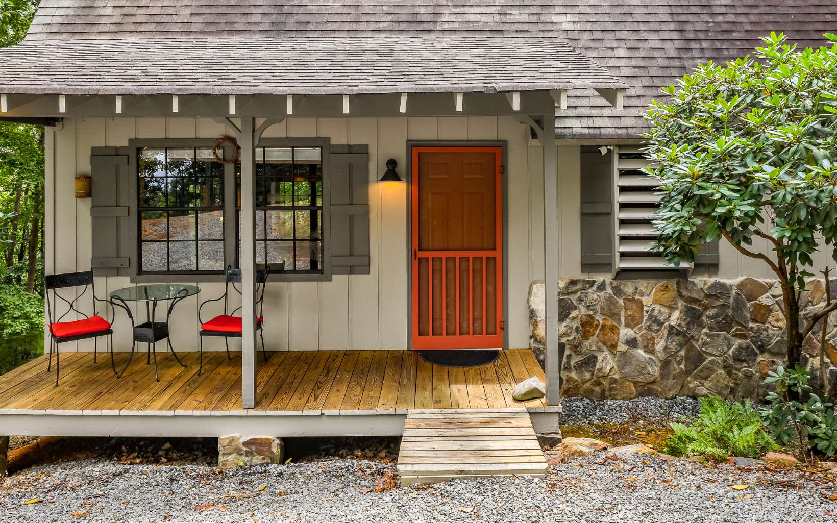 a view of house with outdoor seating
