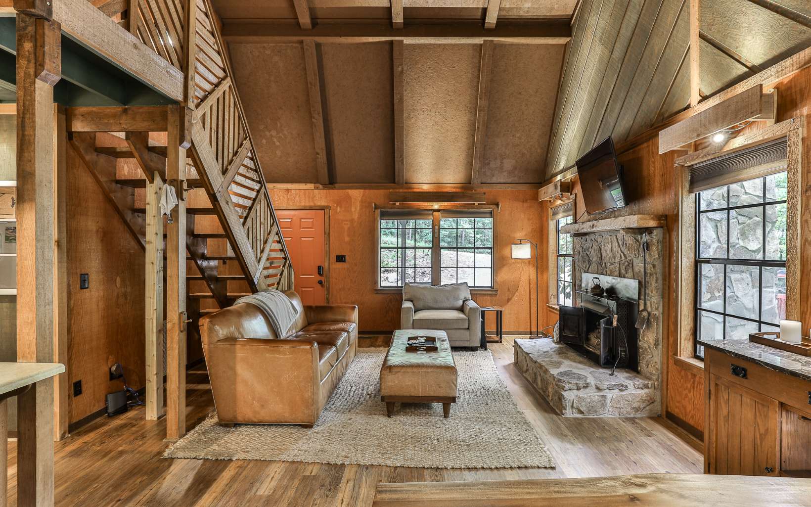 241 Walnut Mountain Road Ellijay, GA 30536 - Photo 13 of 34 a view of a living room with furniture and a fireplace
