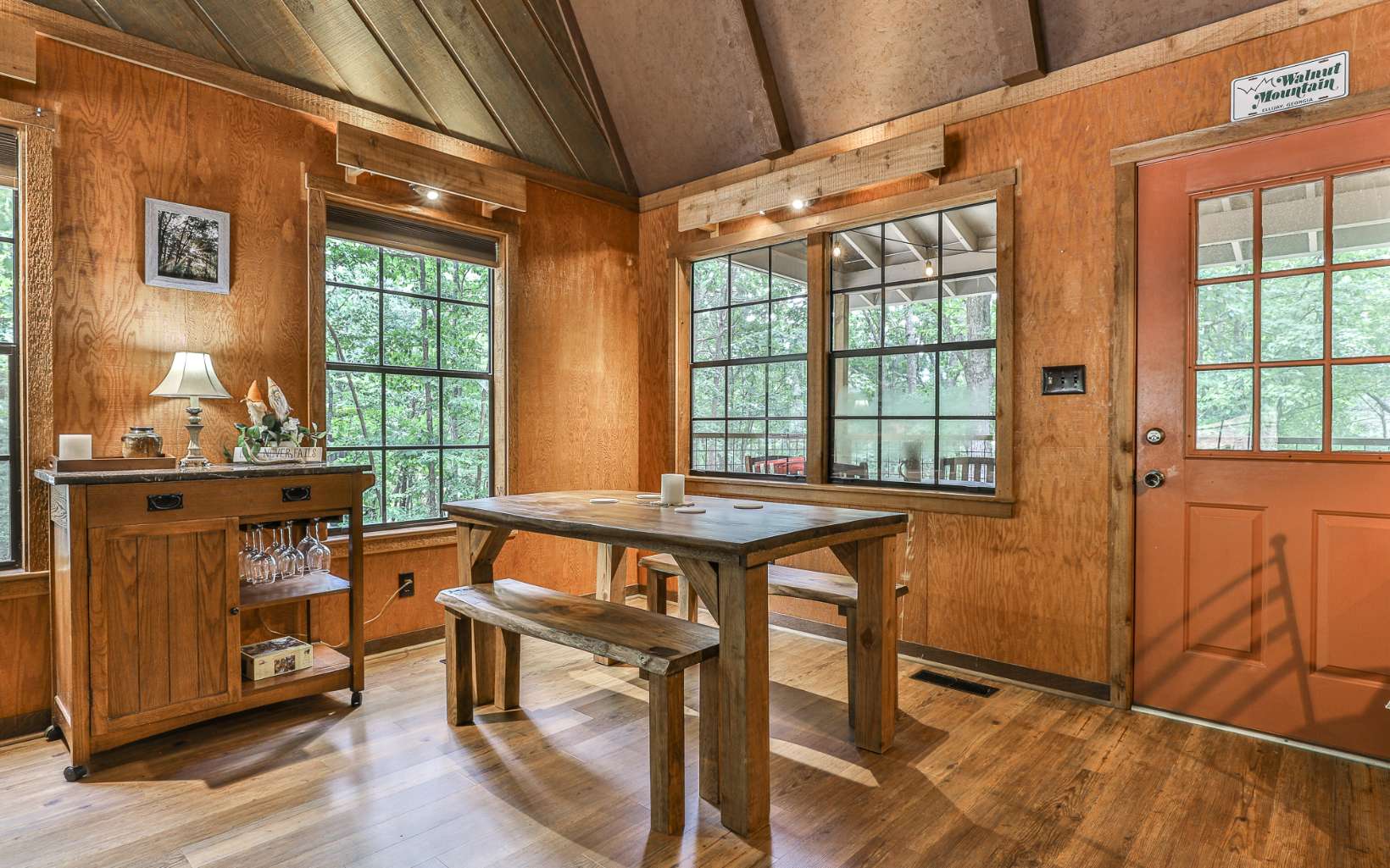 241 Walnut Mountain Road Ellijay, GA 30536 - Photo 16 of 34 a dining room with furniture and windows