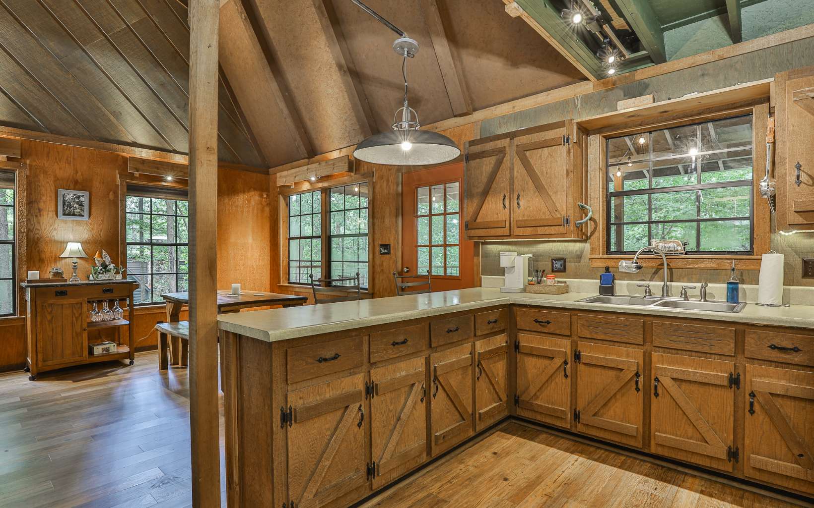 241 Walnut Mountain Road Ellijay, GA 30536 - Photo 19 of 34 a kitchen with wooden cabinets and sink