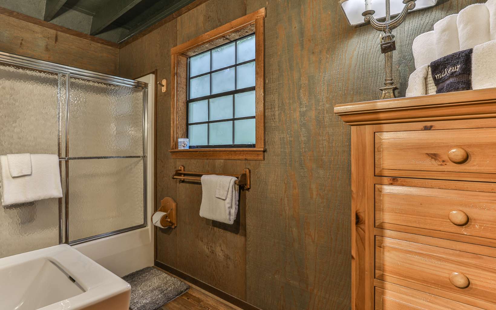 241 Walnut Mountain Road Ellijay, GA 30536 - Photo 20 of 34 a bathroom with a shower and a sink