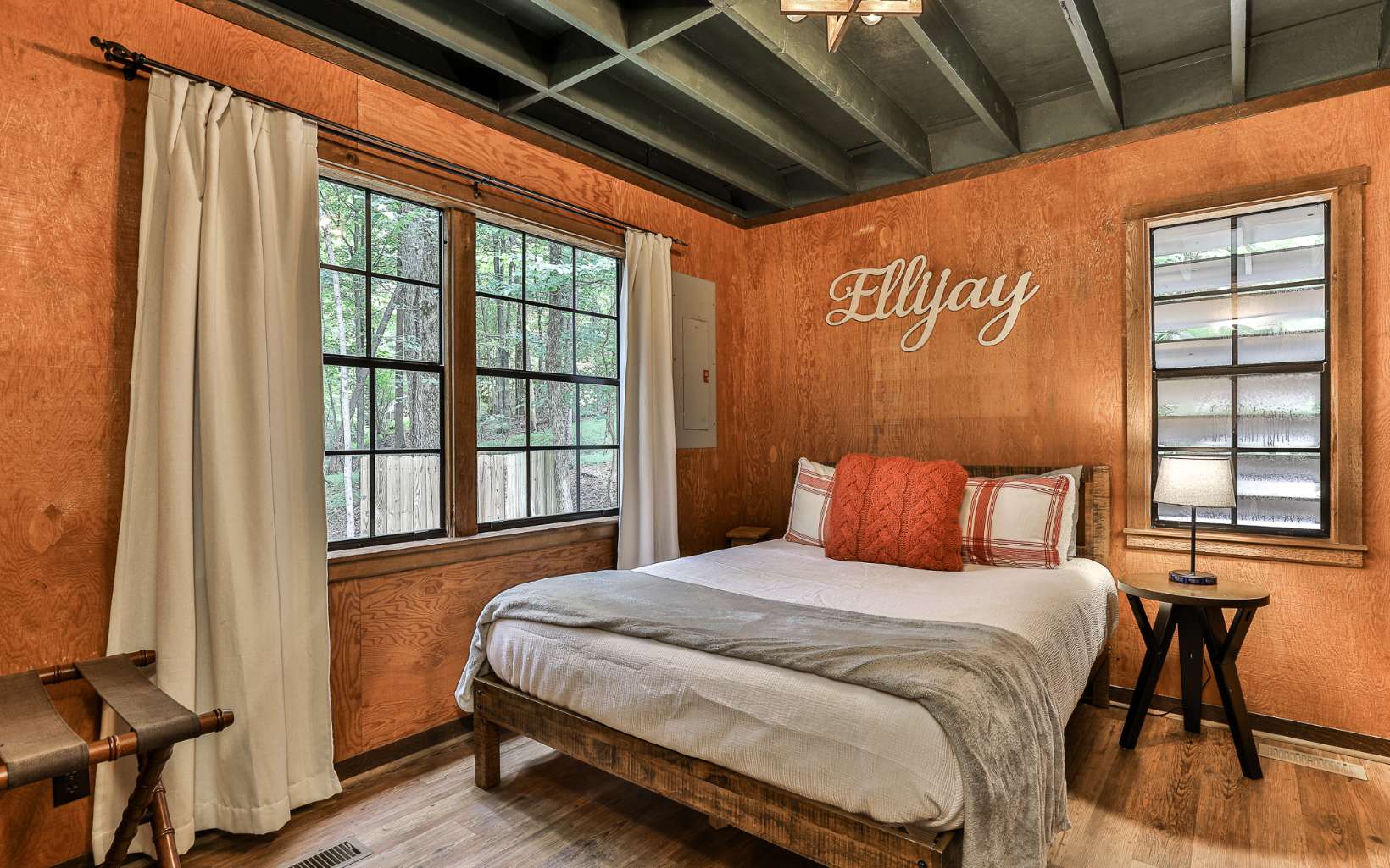 241 Walnut Mountain Road Ellijay, GA 30536 - Photo 21 of 34 a bedroom with a large bed and a window