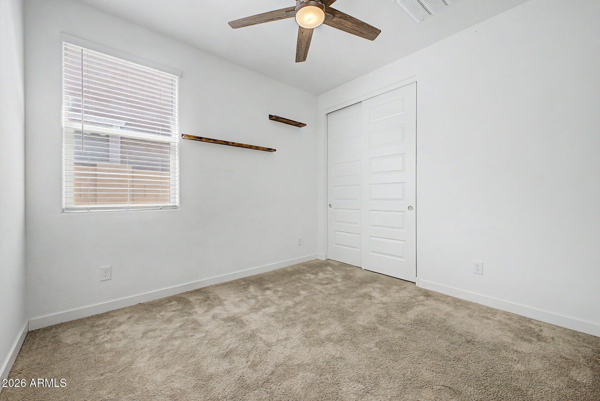 23080 East Stacey Road Queen Creek, AZ 85142 - Photo 24 of 42 a view of an empty room with a window