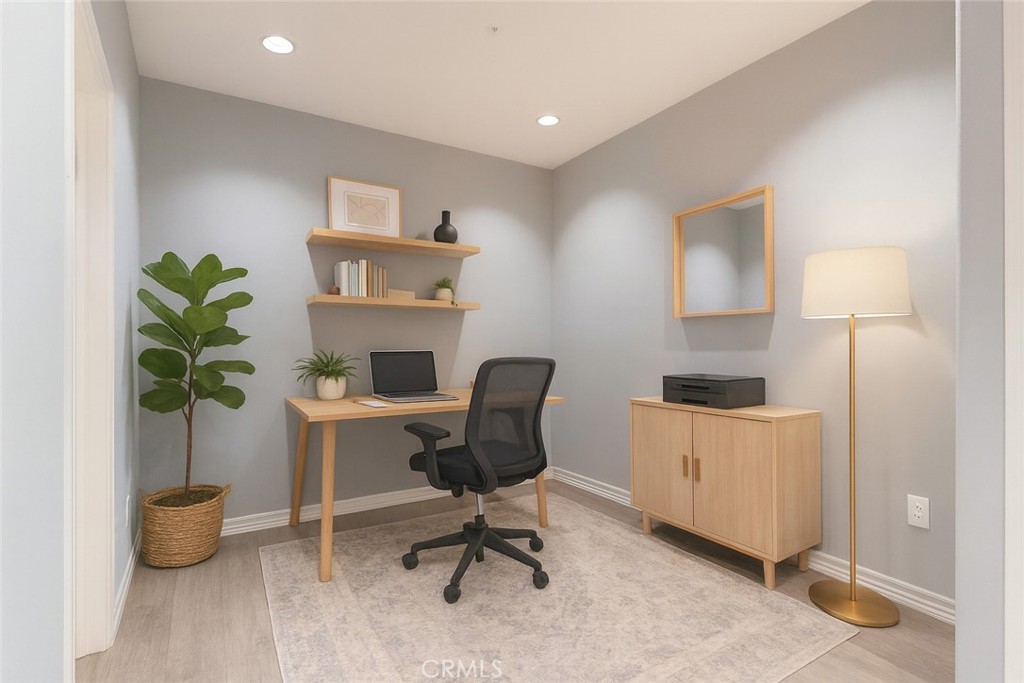 2233 Martin, Unit 108 Irvine, CA 92612 - Photo 11 of 34 a workspace with furniture and a potted plant