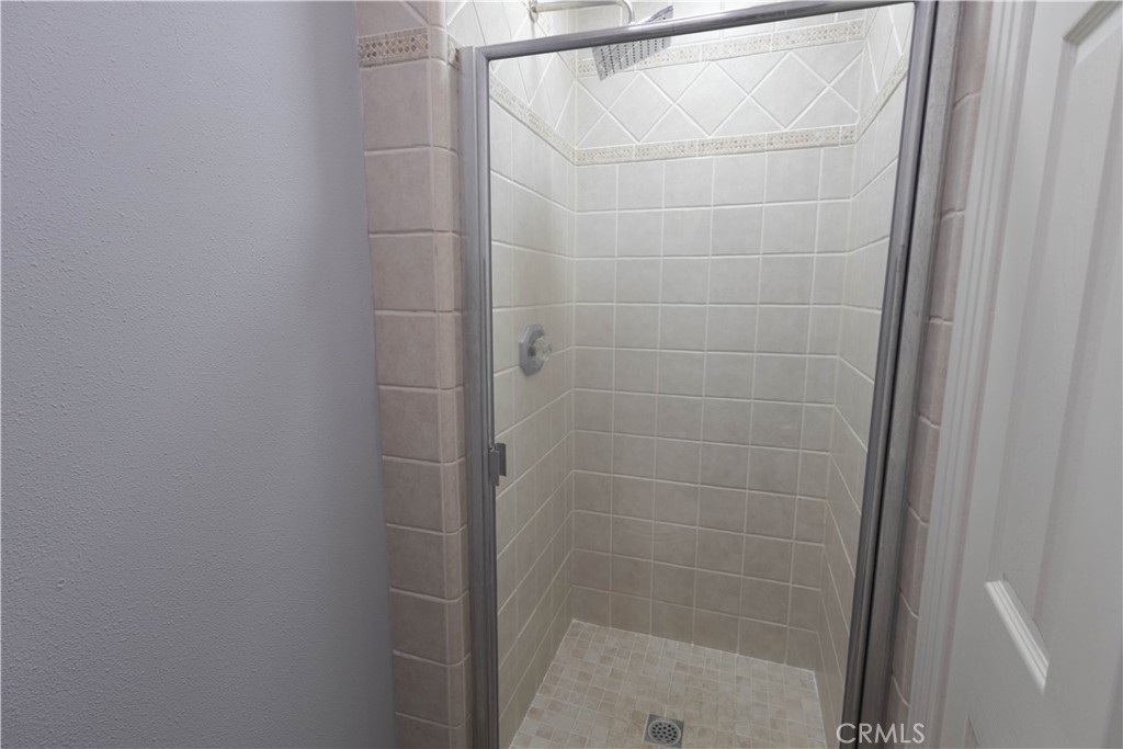 2233 Martin, Unit 108 Irvine, CA 92612 - Photo 14 of 34 a bathroom with a shower
