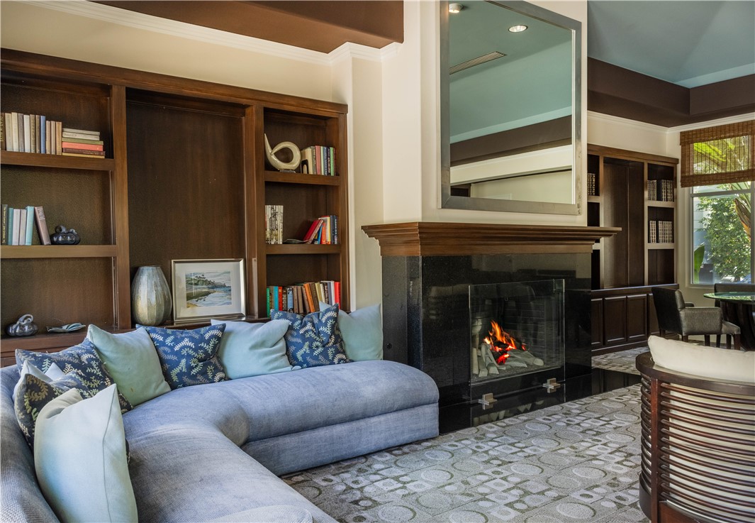 2233 Martin, Unit 108 Irvine, CA 92612 - Photo 18 of 34 a living room with furniture and a fireplace