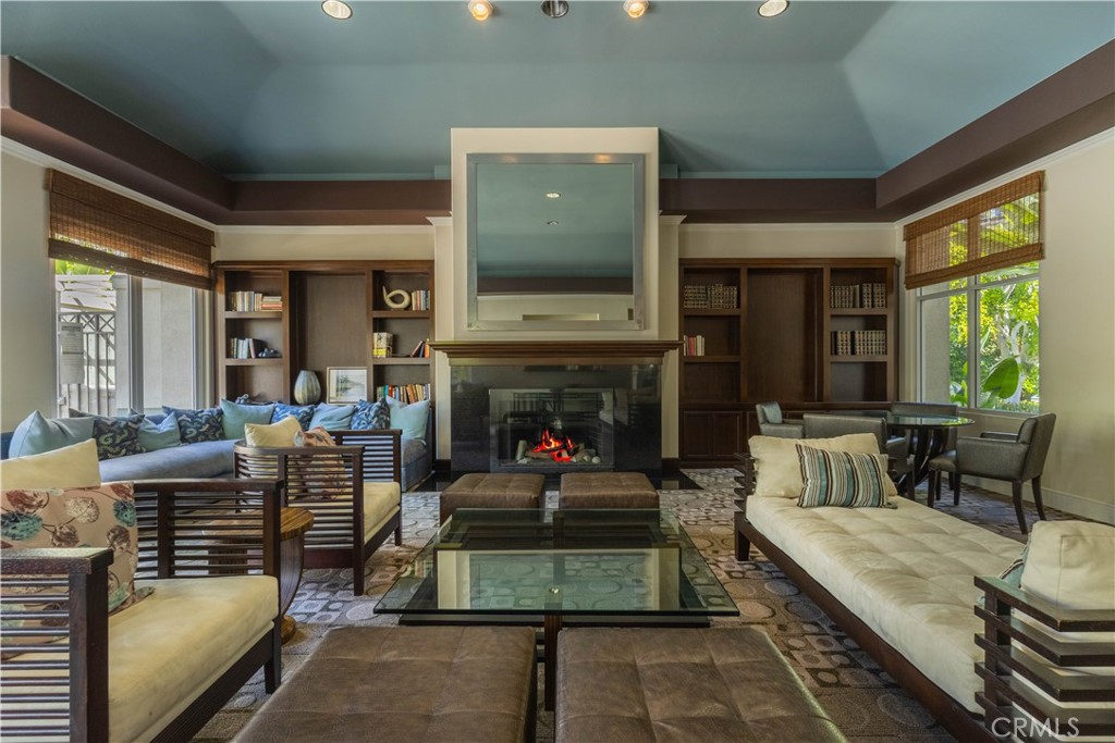 2233 Martin, Unit 108 Irvine, CA 92612 - Photo 19 of 34 a living room with furniture fireplace and window