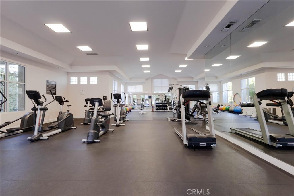 2233 Martin, Unit 108 Irvine, CA 92612 - Photo 20 of 34 a view of a room with gym equipment