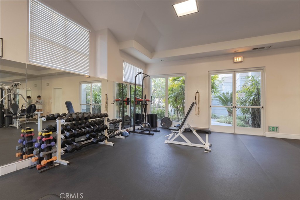2233 Martin, Unit 108 Irvine, CA 92612 - Photo 21 of 34 a view of a room with gym equipment