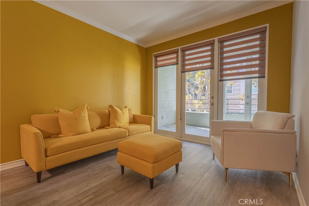 2233 Martin, Unit 108 Irvine, CA 92612 - Photo 6 of 34 a living room with furniture and a large window