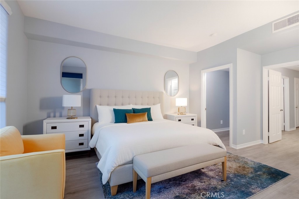 2233 Martin, Unit 108 Irvine, CA 92612 - Photo 9 of 34 a bedroom with a bed and a couch