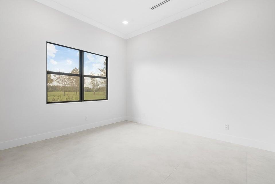 170 Southeast Rio Angelica Port St. Lucie, FL 34984 - Photo 43 of 55 an empty room with windows