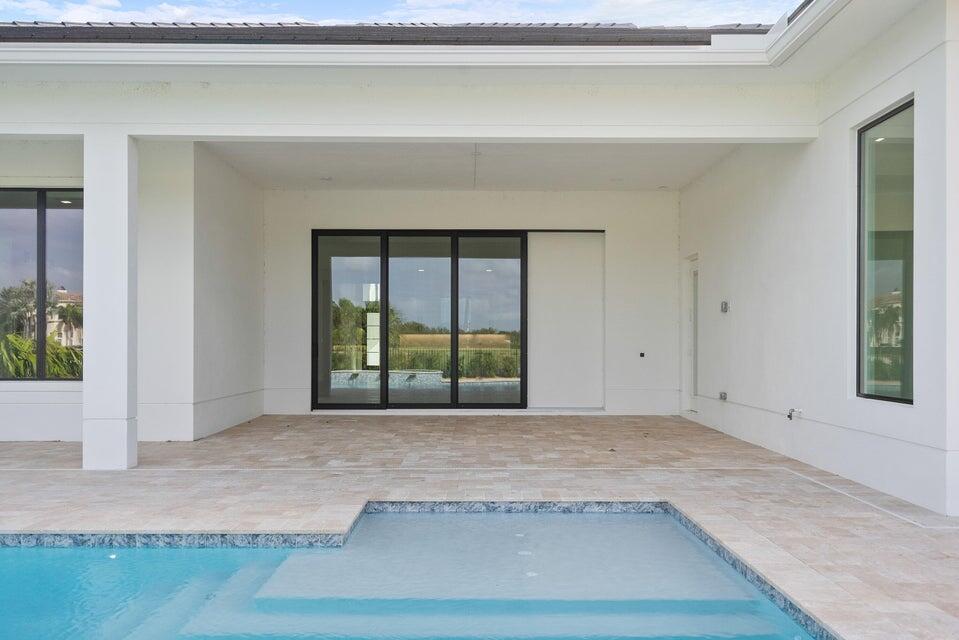 170 Southeast Rio Angelica Port St. Lucie, FL 34984 - Photo 47 of 55 a view of an empty room with wooden floor and a window