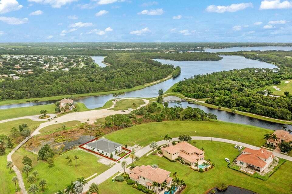 170 Southeast Rio Angelica Port St. Lucie, FL 34984 - Photo 54 of 55 a view of a lake with a mountain