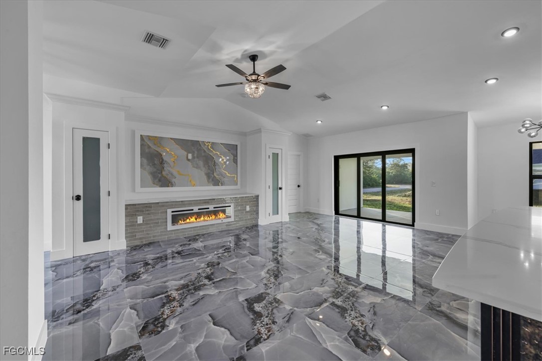 2901 2nd Street Southwest Lehigh Acres, FL 33976 - Photo 6 of 40 a living room with furniture