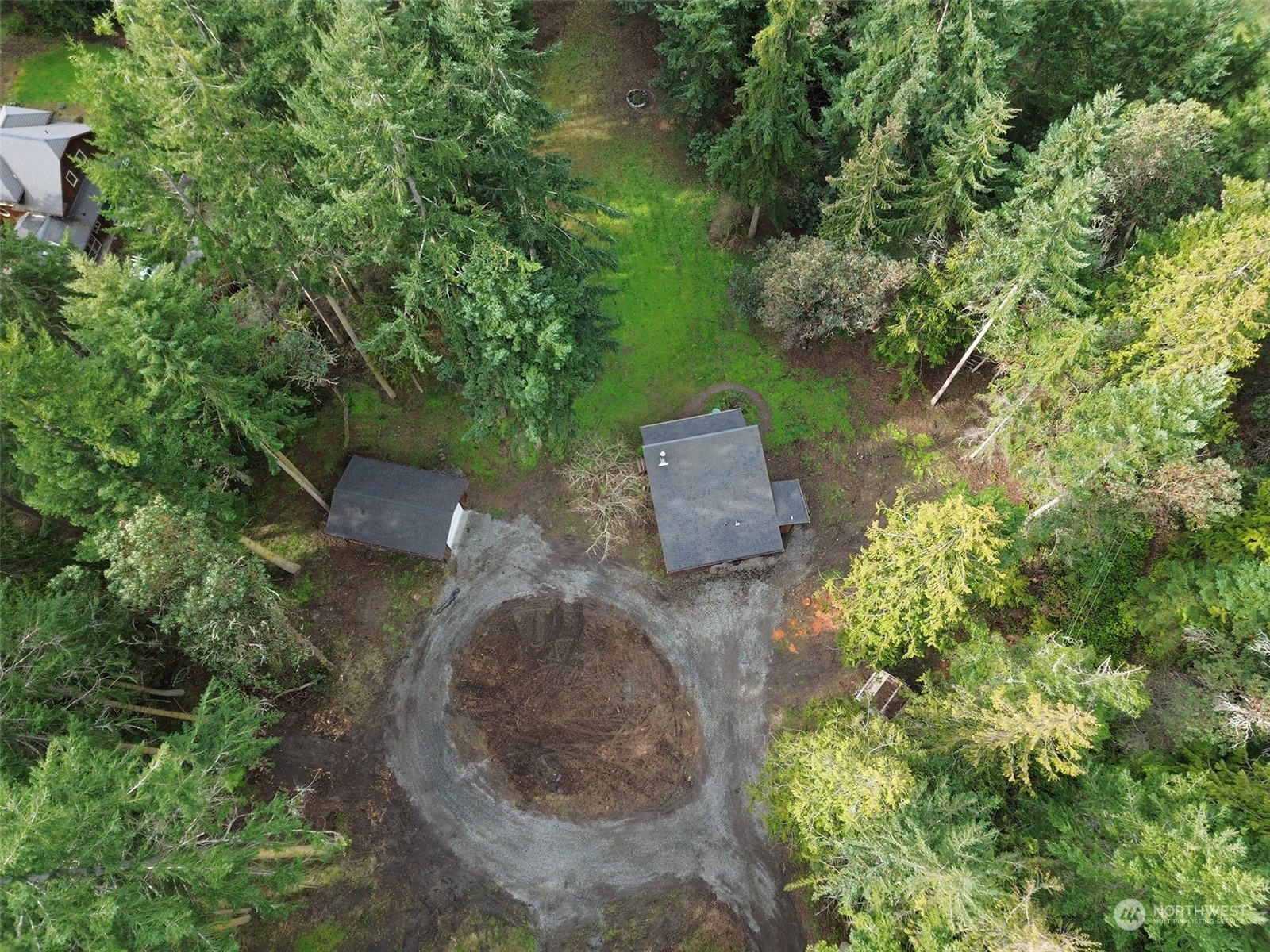 253 Sylvan Ridge Road Sequim, WA 98382 - Photo 36 of 40 an aerial view of a house with a yard