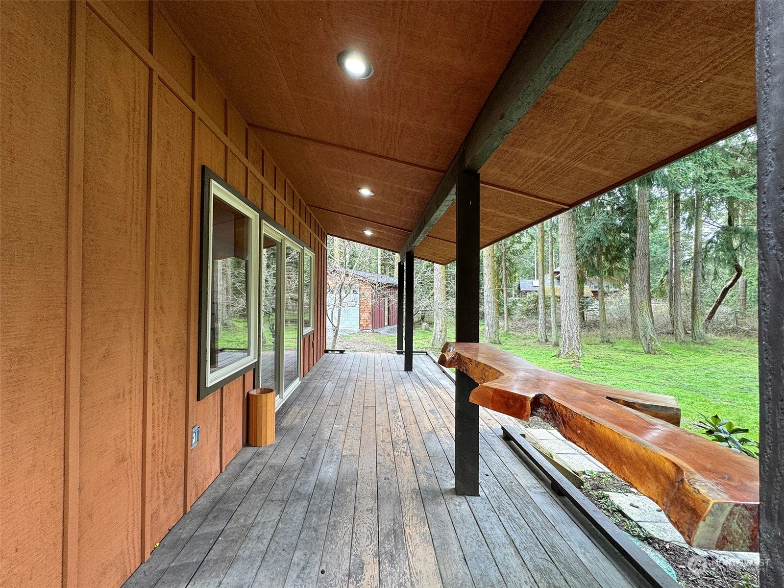 253 Sylvan Ridge Road Sequim, WA 98382 - Photo 5 of 40 a view of a room with wooden floor and outdoor space