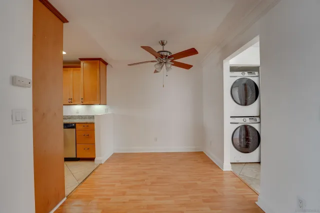 a view of a hallway with washer and dryer