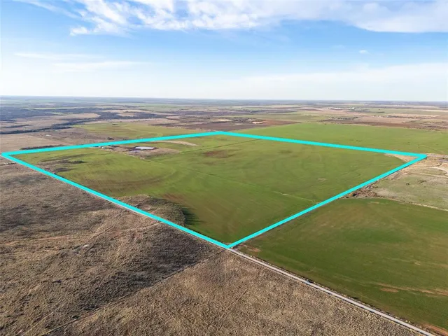 a view of an outdoor space and a yard