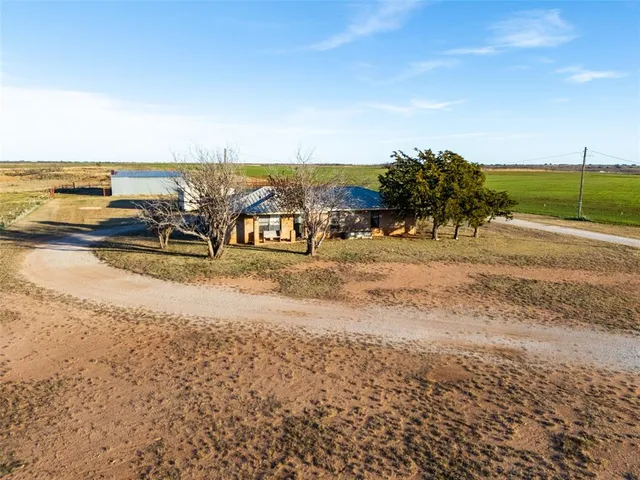 an ocean beach with residential houses