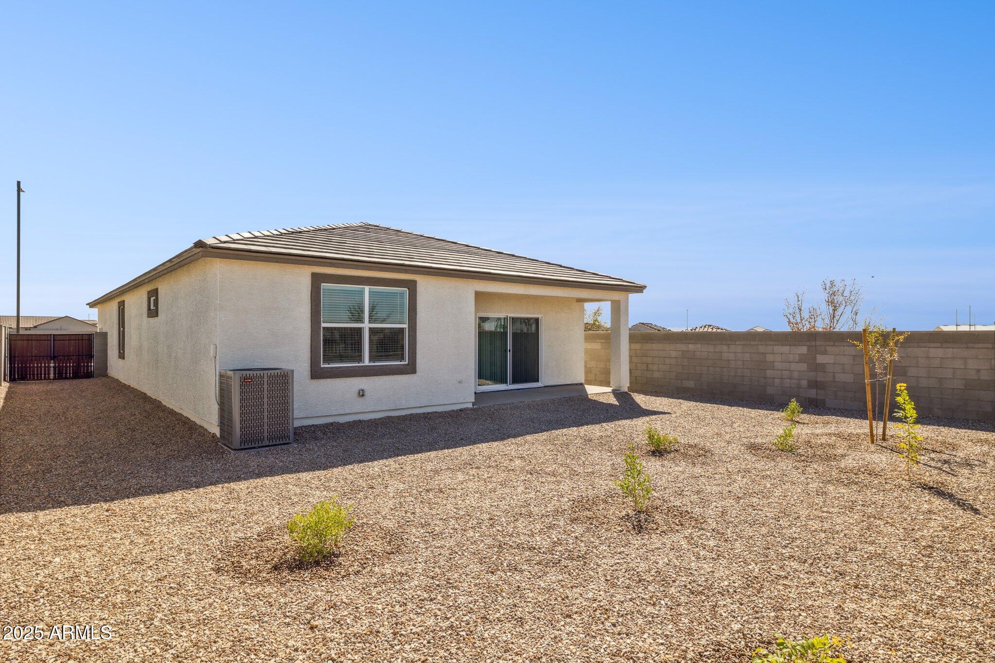 25434 West Fraktur Road Buckeye, AZ 85326 - Photo 13 of 14 a view of a house with a snow in the background