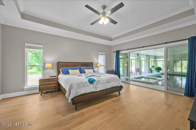 a bed room with a bed and a window