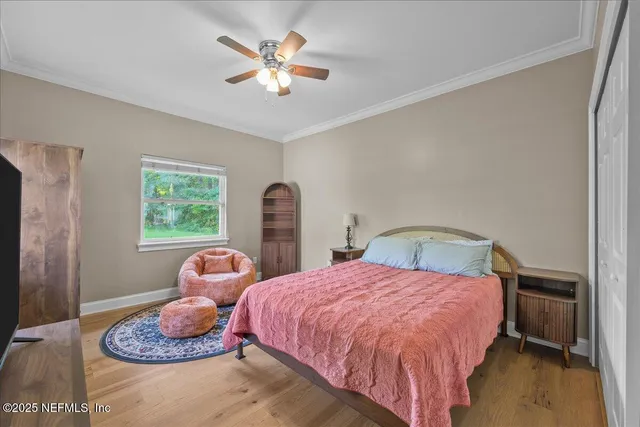 a view of a city with lush green forest