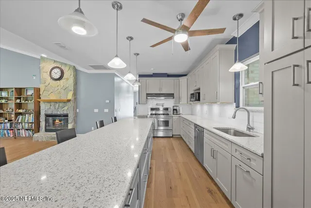 a bedroom with a large bed and a large window