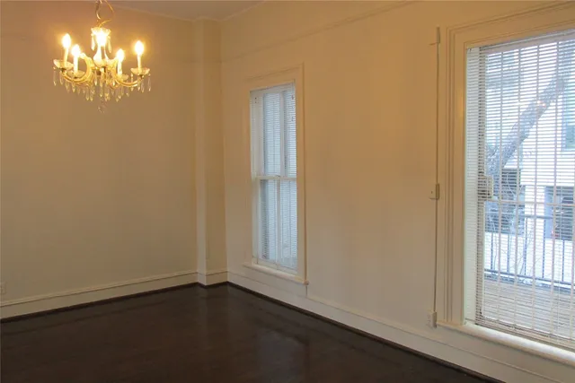 a view of hallway with windows