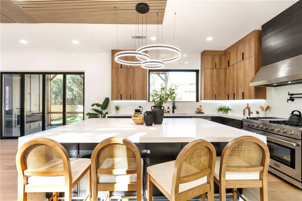 2986 San Jose Drive Decatur, GA 30032 - Photo 14 of 71 a spacious bathroom with a granite countertop tub and a large window
