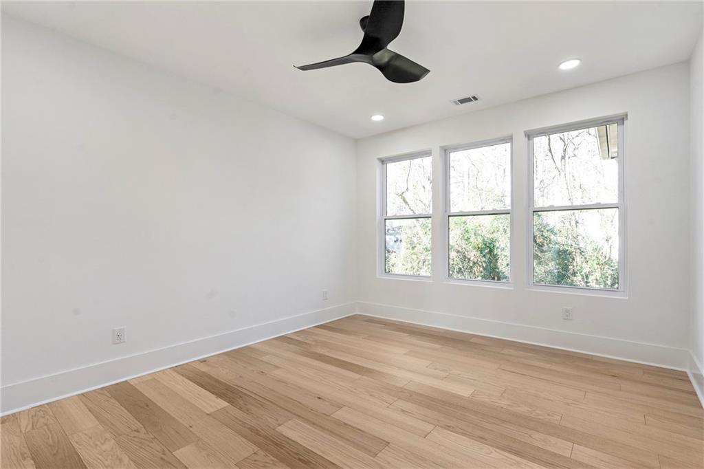 2986 San Jose Drive Decatur, GA 30032 - Photo 33 of 71 an empty room with a window and a ceiling fan
