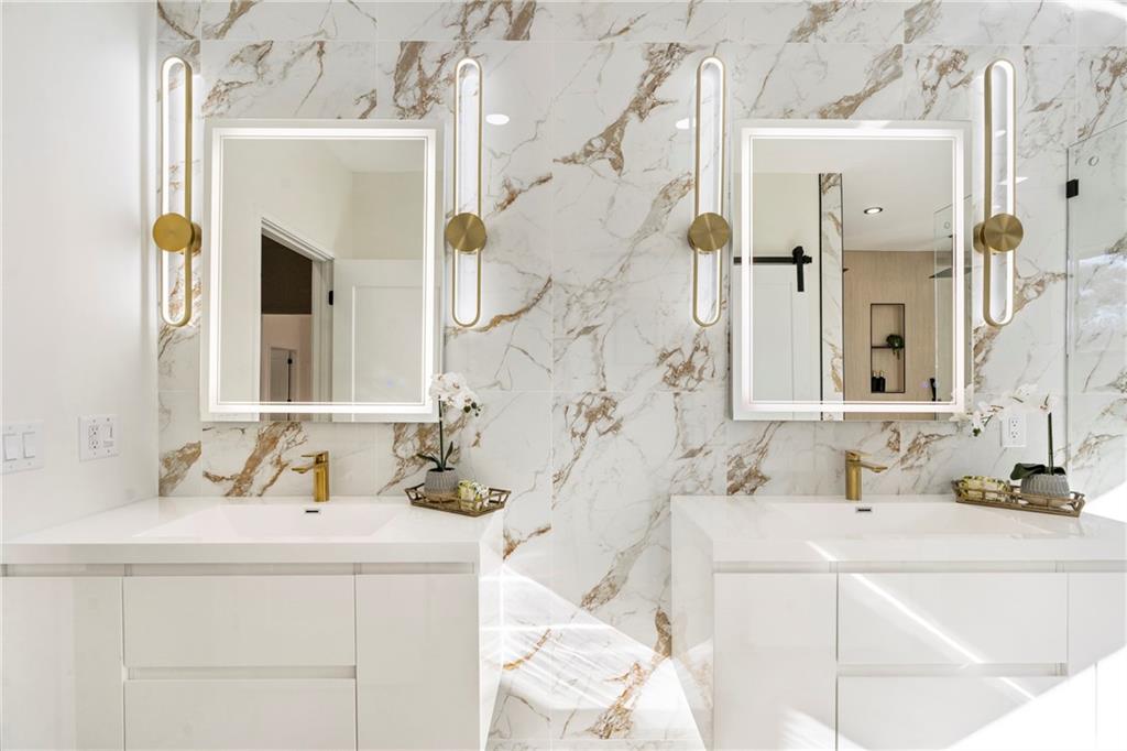 2986 San Jose Drive Decatur, GA 30032 - Photo 52 of 71 a bathroom with a sink and a mirror
