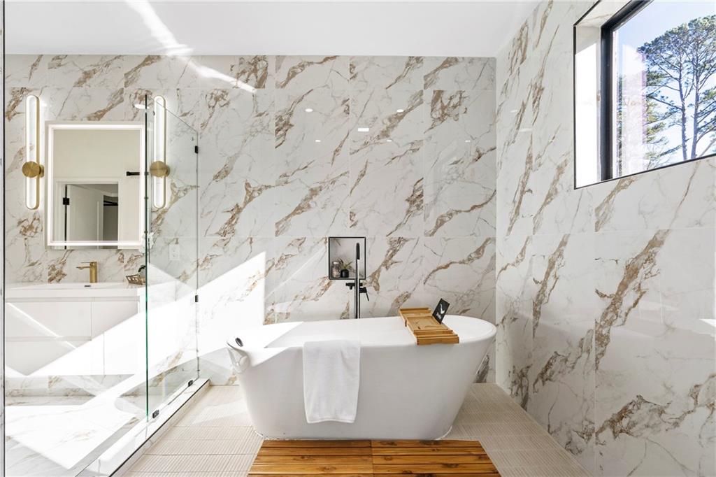 2986 San Jose Drive Decatur, GA 30032 - Photo 55 of 71 a bathroom with a bathtub and shower