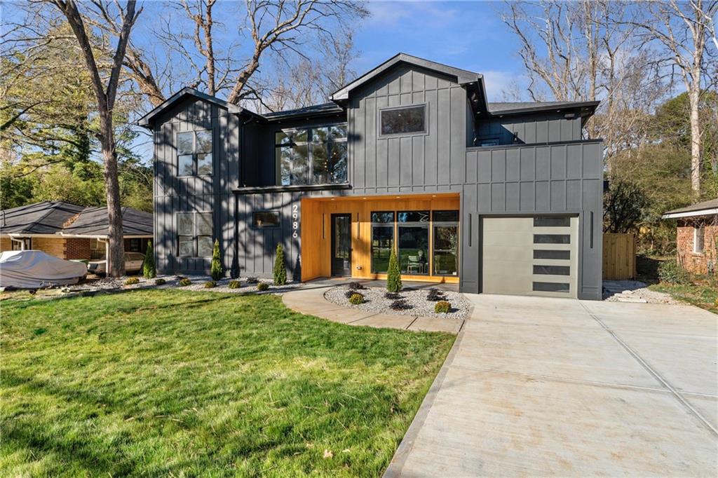 2986 San Jose Drive Decatur, GA 30032 - Photo 71 of 71 a front view of a house with sitting area and garden