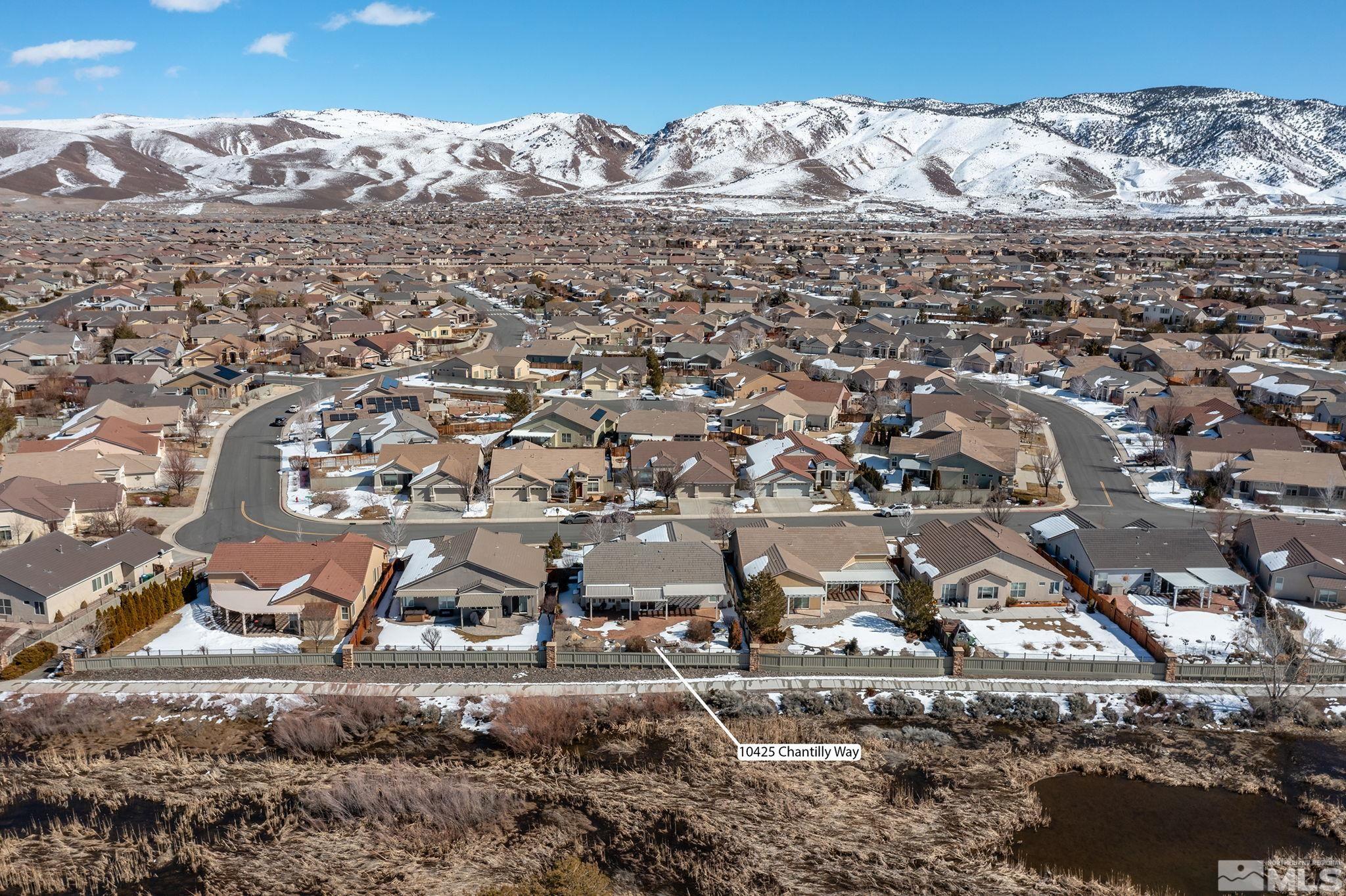 10425 Chantilly Way Reno, NV 89521 - Photo 26 of 33 an aerial view of residential houses with outdoor space