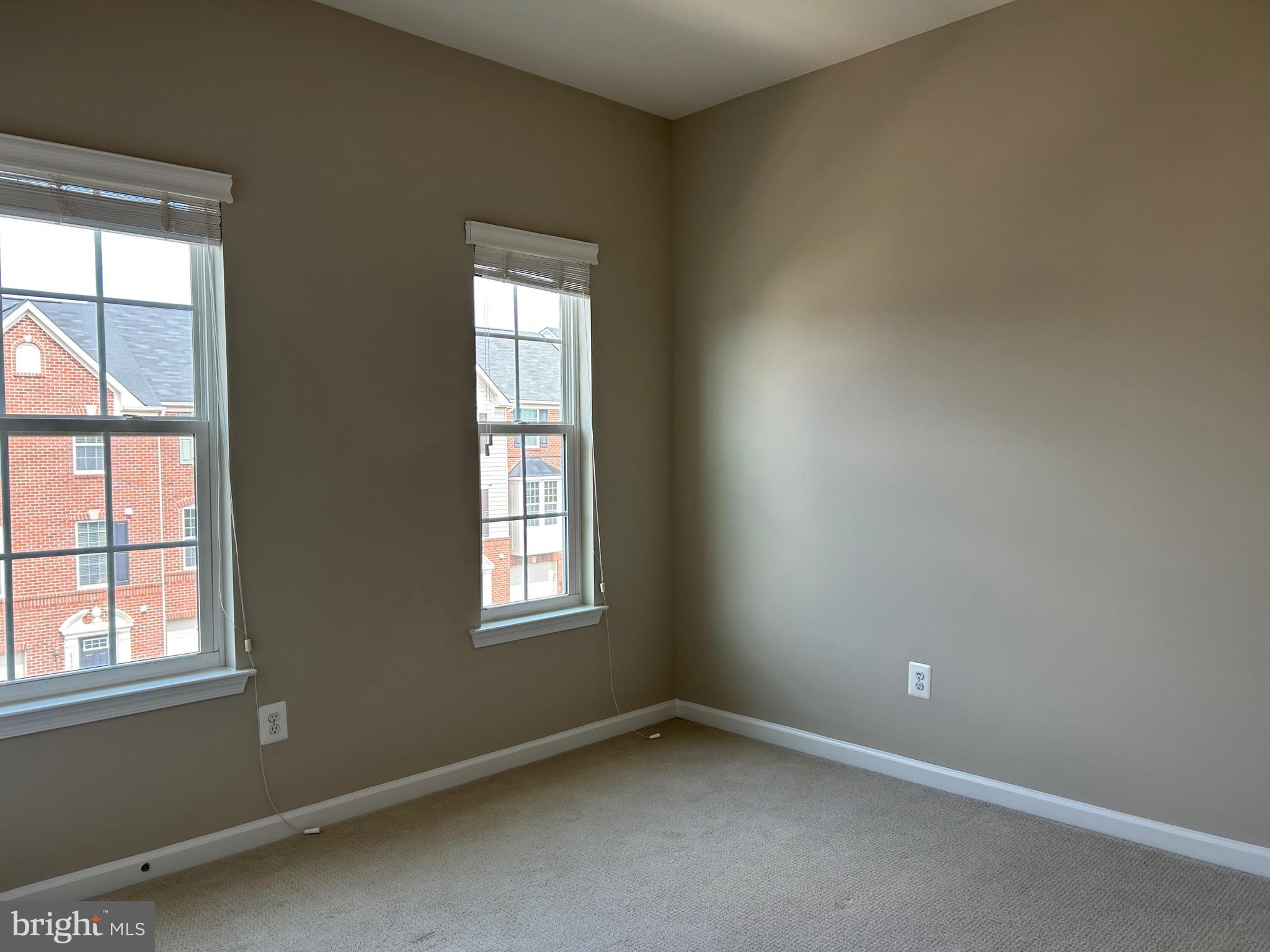 45901 Peach Oak Terrace Sterling, VA 20166 - Photo 11 of 14 an empty room with a window