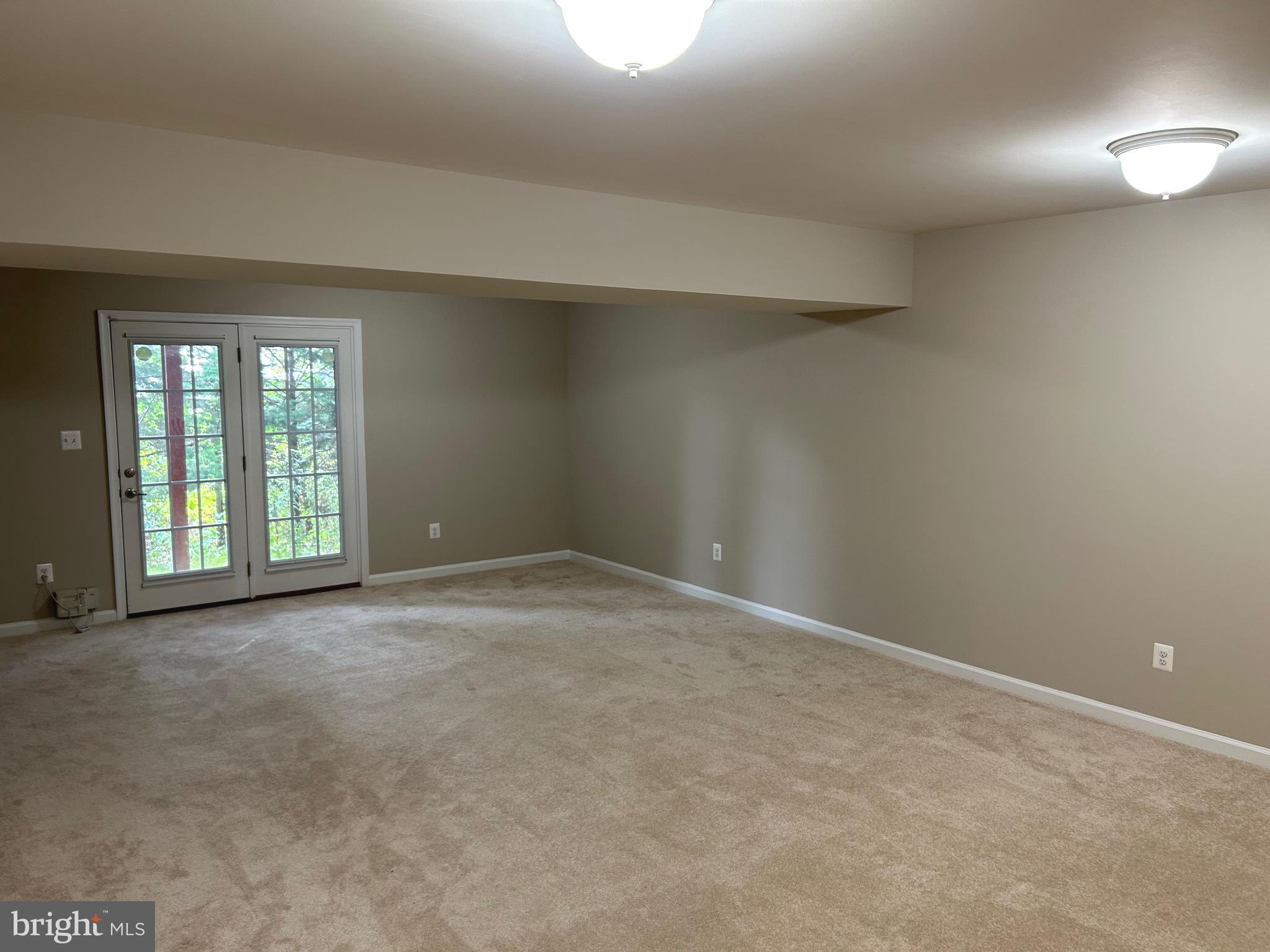 45901 Peach Oak Terrace Sterling, VA 20166 - Photo 13 of 14 an empty room with windows
