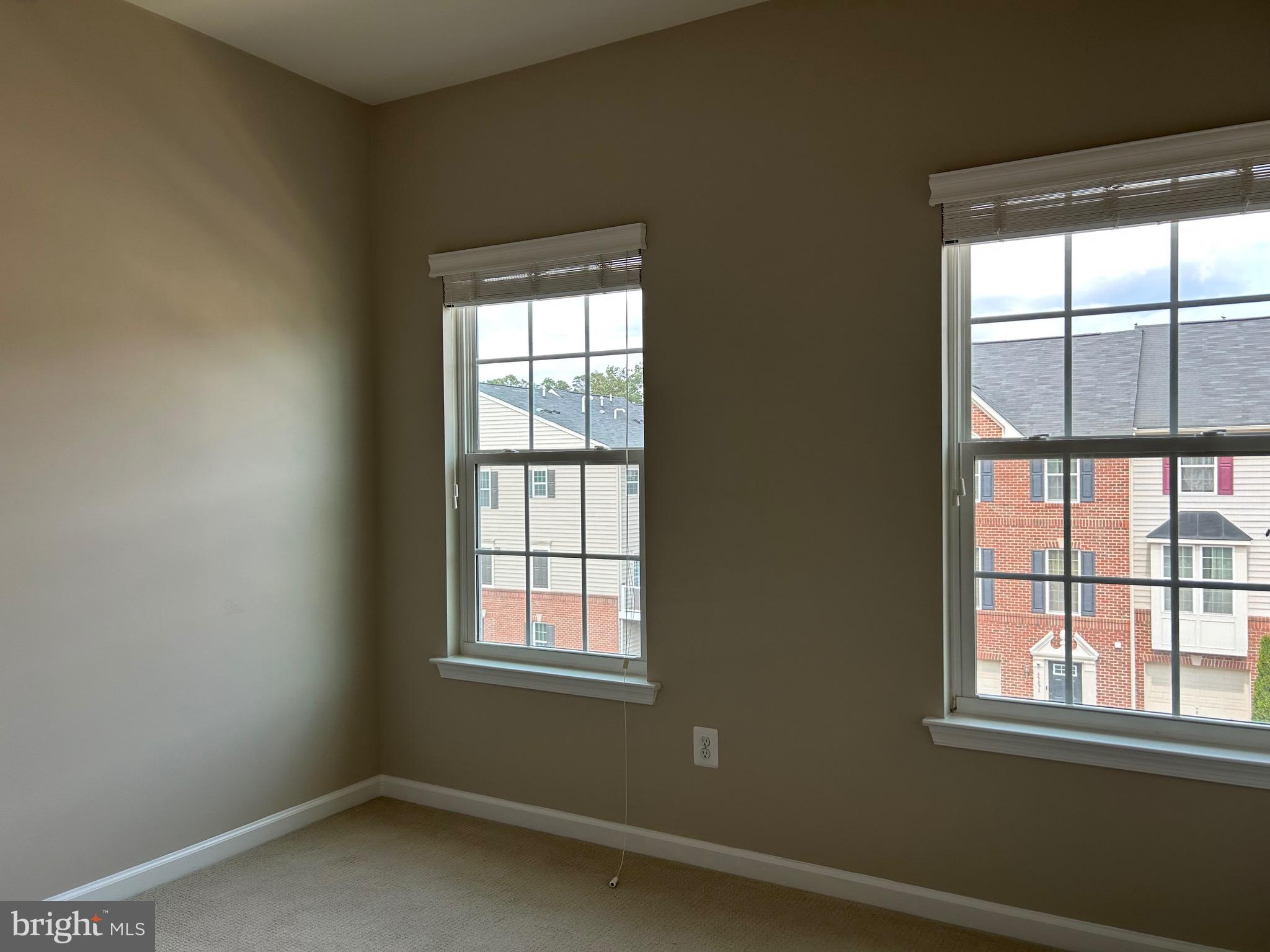 45901 Peach Oak Terrace Sterling, VA 20166 - Photo 10 of 14 an empty room with a window