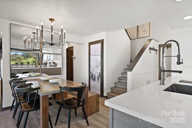 105 Beechtop Road Beech Mountain, NC 28604 - Photo 23 of 42 a view of a dining room with furniture and window