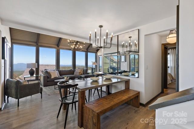 105 Beechtop Road Beech Mountain, NC 28604 - Photo 6 of 42 a very nice looking living room with a large window and furniture