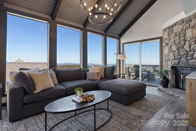 105 Beechtop Road Beech Mountain, NC 28604 - Photo 7 of 42 a living room with furniture and a large window