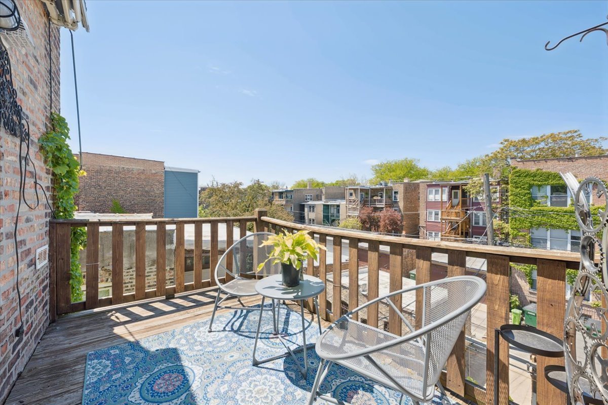 6348 North Magnolia Avenue, Unit 3 Chicago, IL 60660 - Photo 16 of 19 a view of a balcony with chairs