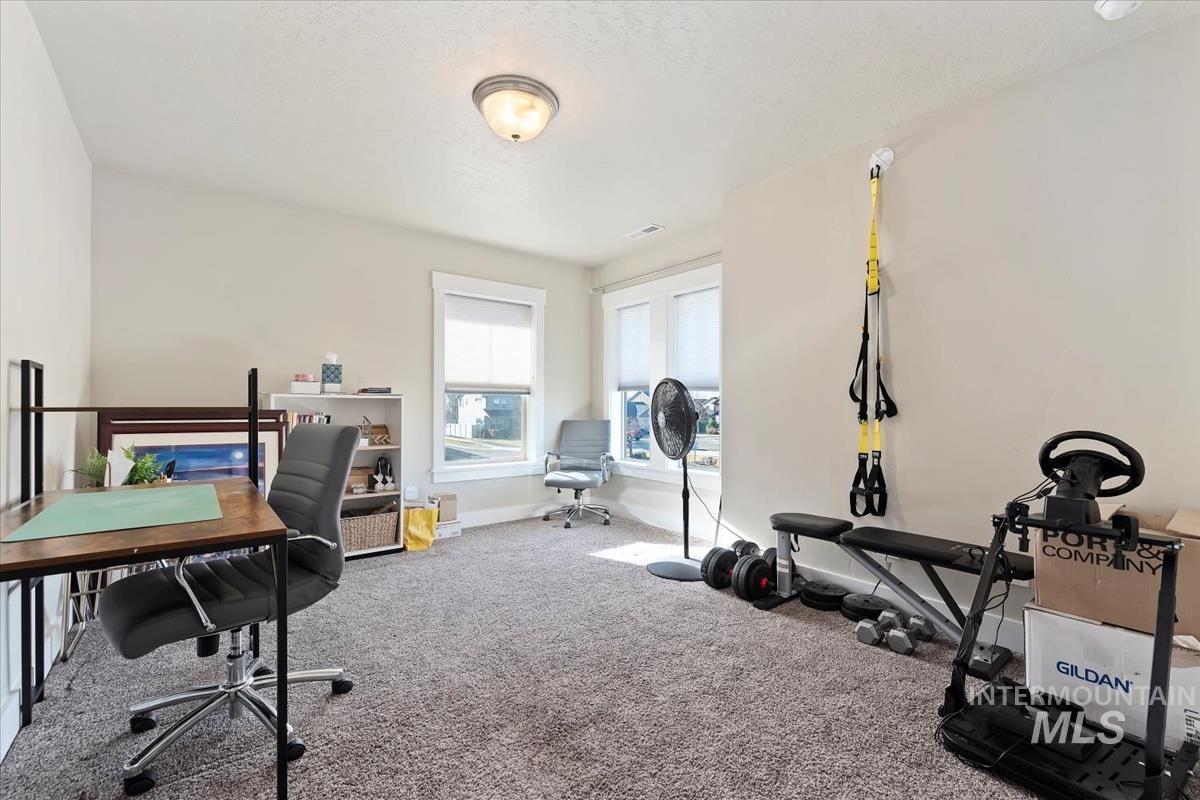 8014 South Bogus Ridge Way Boise, ID 83716 - Photo 23 of 44 Office space with baseboards and carpet