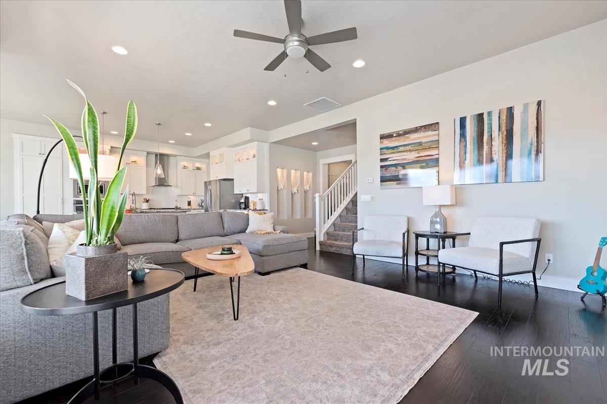 8014 South Bogus Ridge Way Boise, ID 83716 - Photo 40 of 44 Living room featuring a ceiling fan, dark wood-style flooring, and recessed lighting