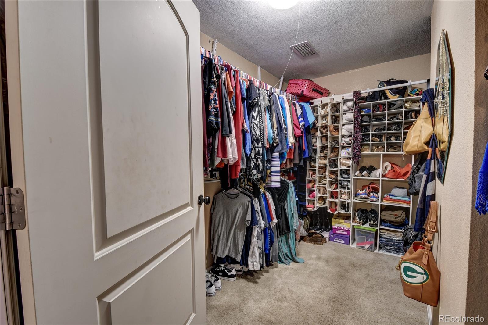 820 South Denver Avenue Fort Lupton, CO 80621 - Photo 12 of 40 a view of walk in closet with clothes