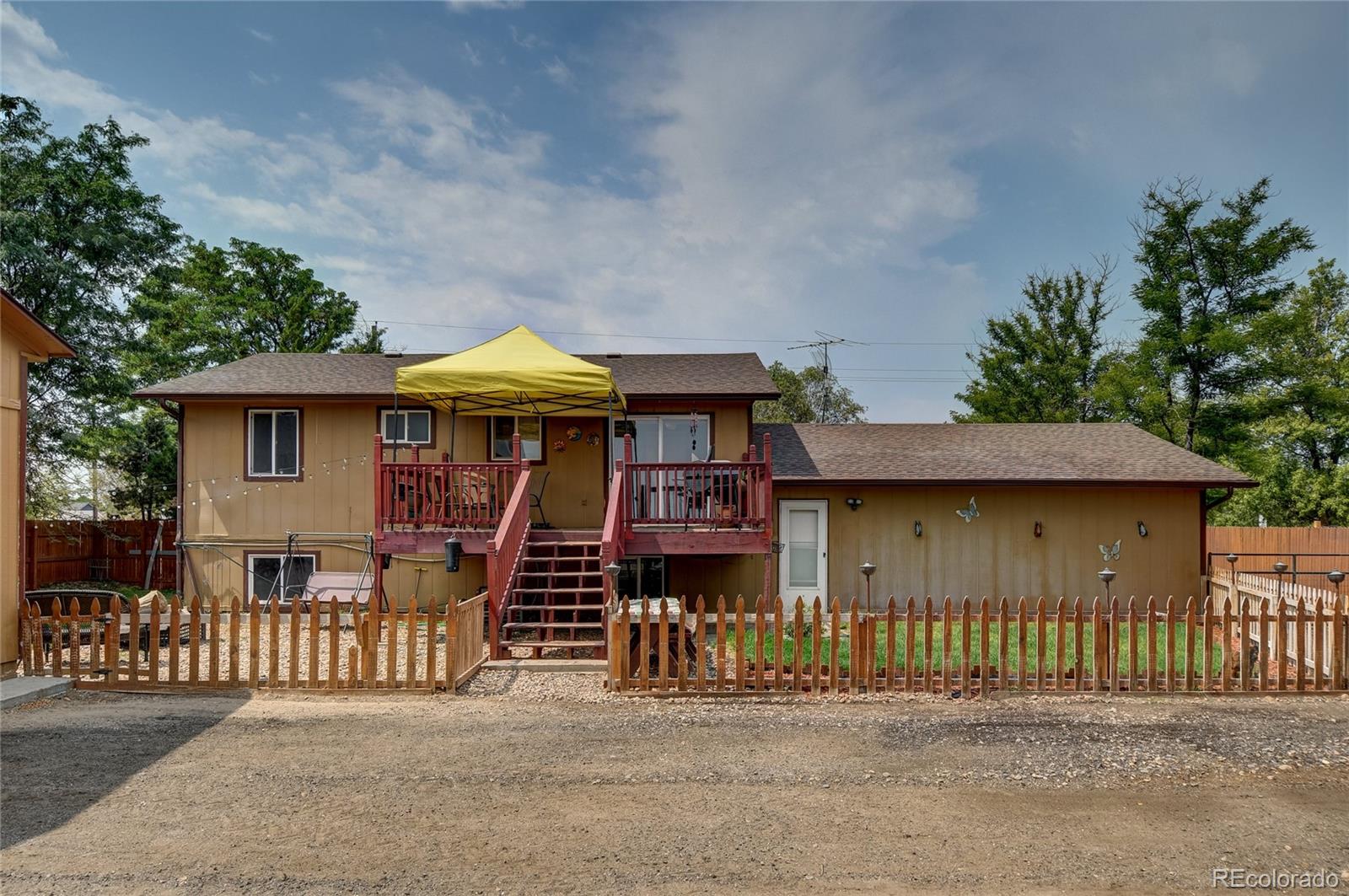 820 South Denver Avenue Fort Lupton, CO 80621 - Photo 21 of 40 a front view of a house