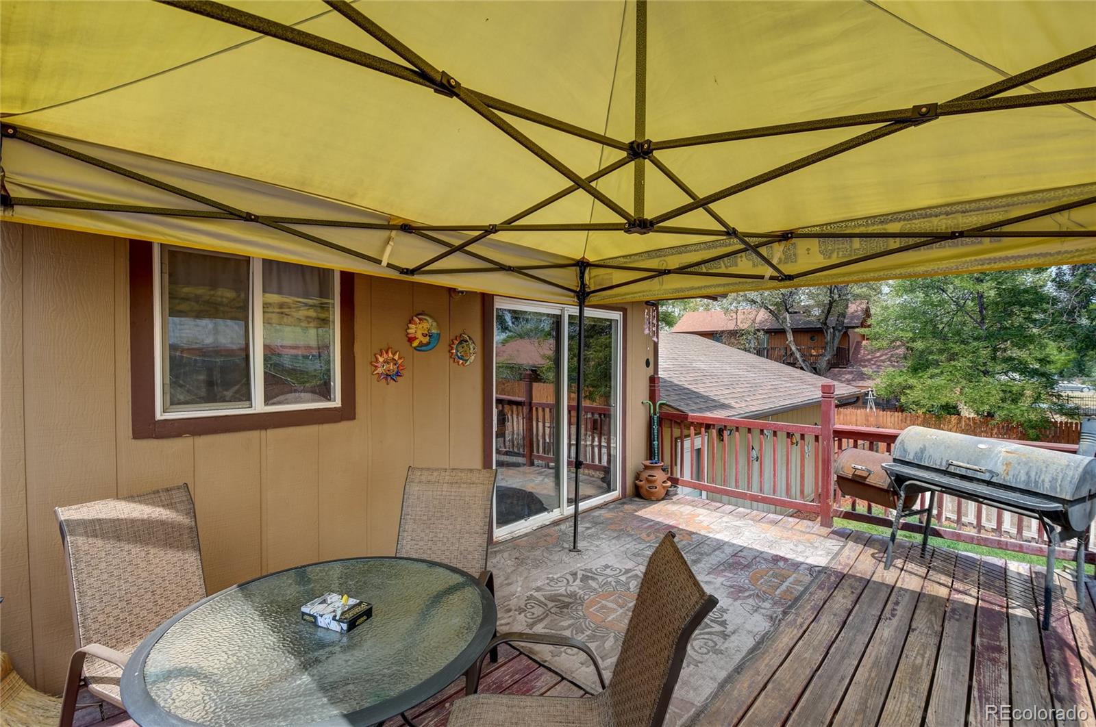 820 South Denver Avenue Fort Lupton, CO 80621 - Photo 22 of 40 a balcony with furniture and wooden floor