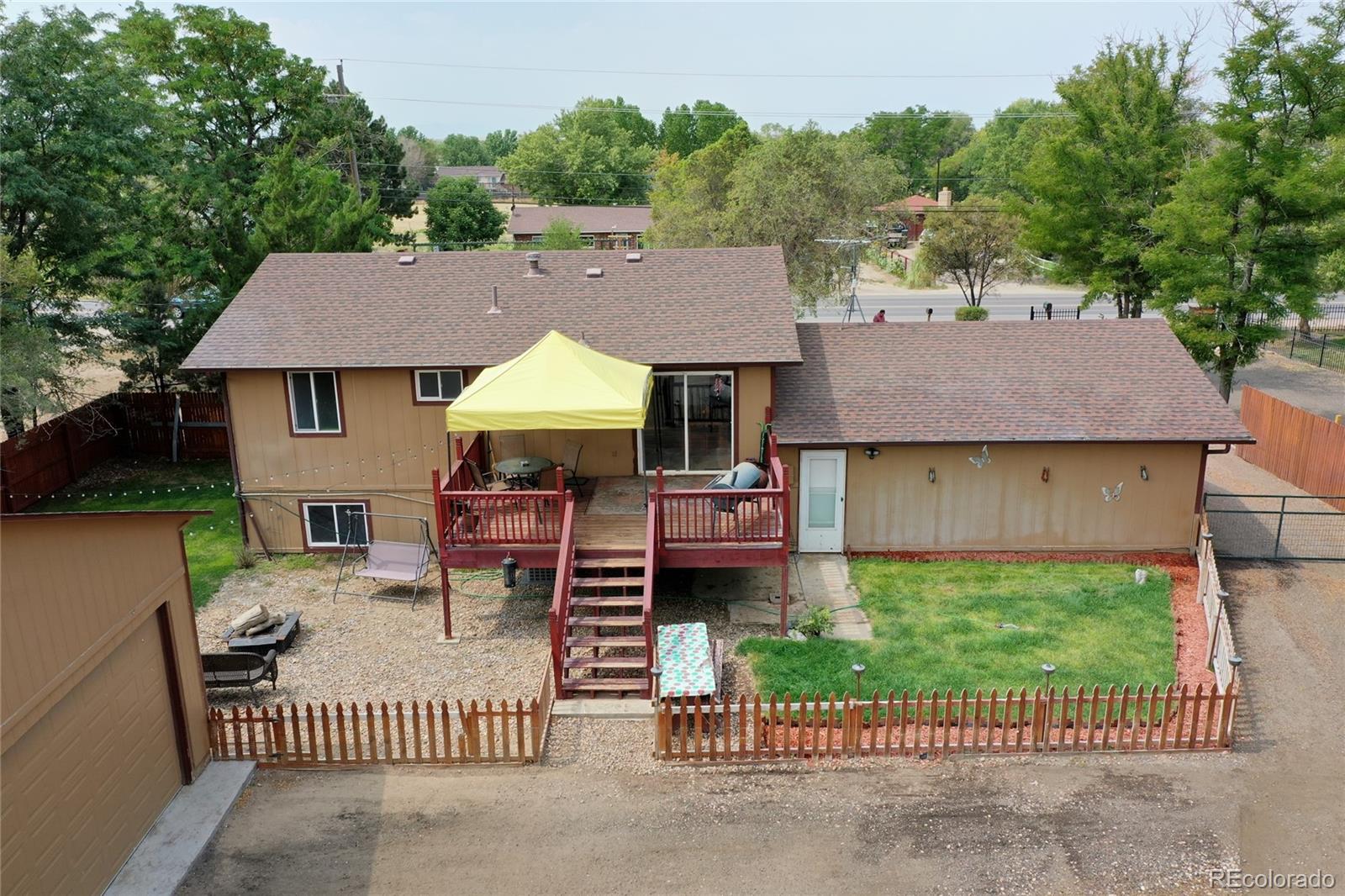 820 South Denver Avenue Fort Lupton, CO 80621 - Photo 30 of 40 an aerial view of a house roof deck